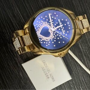 MK smartwatch. In very good condition. Bought two years ago, worn it few times.